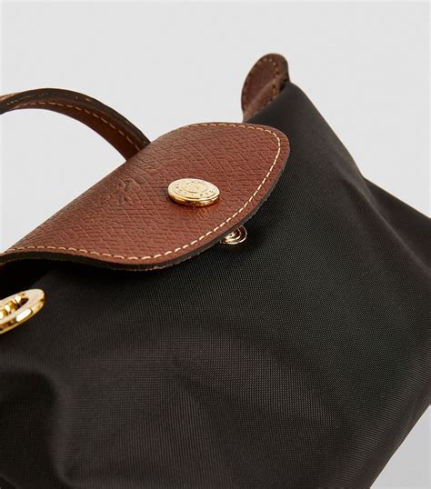 longchamp pouch with strap.